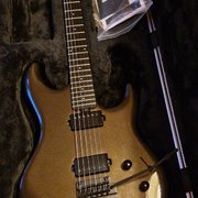 Myydn: 2022 Ernie Ball Music Man Luke III Olive Pearl (#2028376)